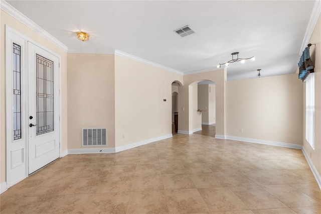 tiled spare room with crown molding