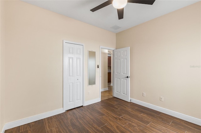 unfurnished bedroom featuring a closet and ceiling fan