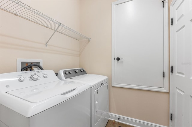 laundry room featuring independent washer and dryer