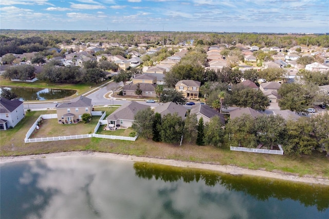 drone / aerial view with a water view