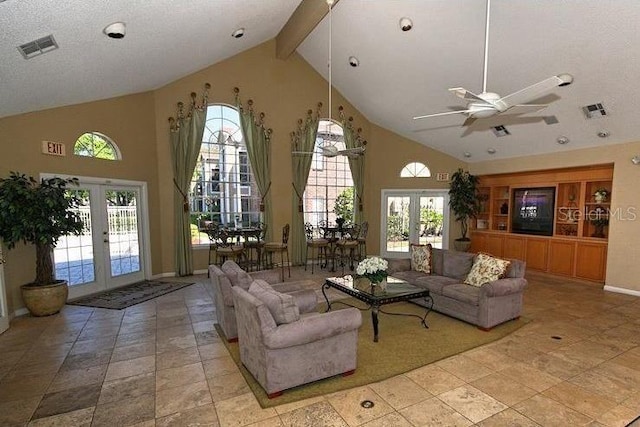 living room with a textured ceiling, high vaulted ceiling, french doors, and beamed ceiling