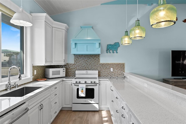 kitchen featuring white cabinetry, white appliances, sink, and pendant lighting