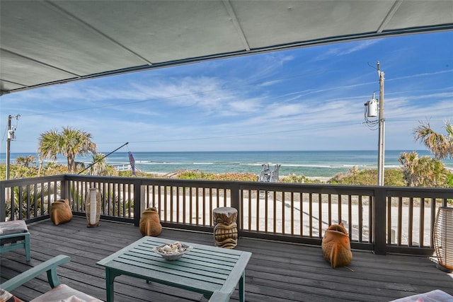 deck featuring a water view