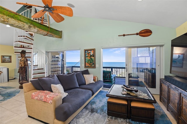 tiled living room with high vaulted ceiling and ceiling fan