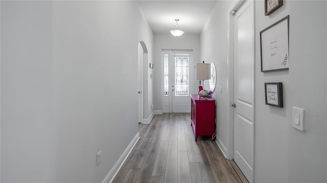 doorway to outside featuring light wood-type flooring