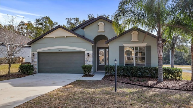 view of front of property with a garage