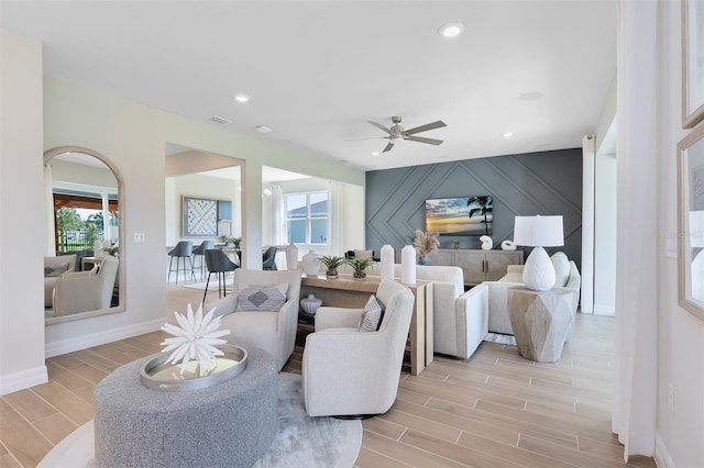 living room with ceiling fan