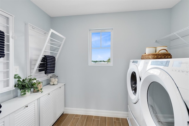 laundry room with washing machine and dryer