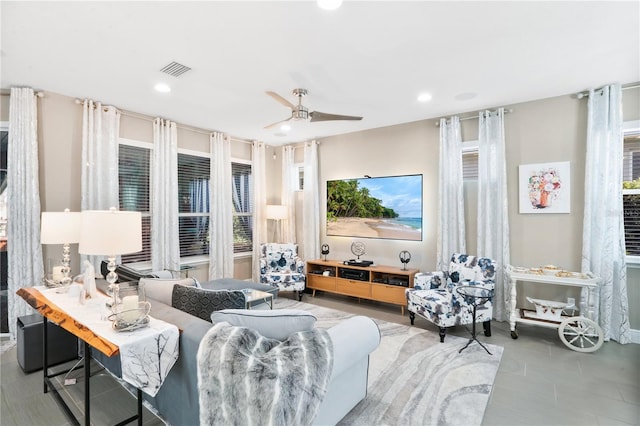 living room featuring ceiling fan