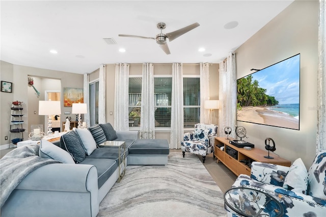 living room featuring ceiling fan