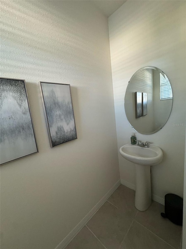 bathroom featuring sink and tile patterned floors