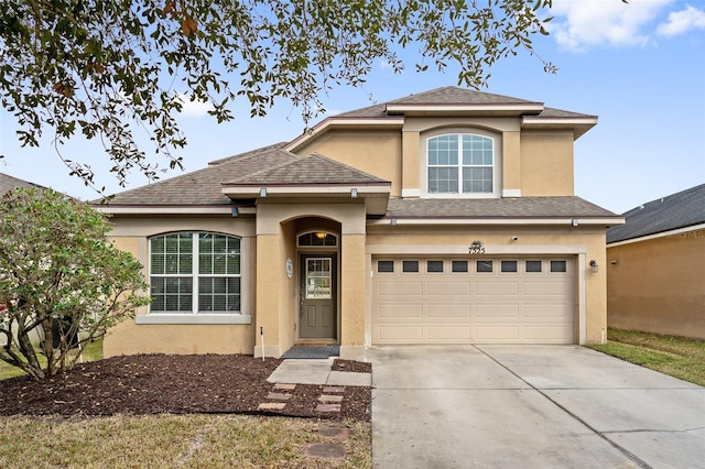 front of property featuring a garage