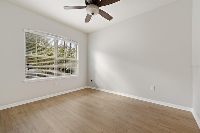 unfurnished room with light hardwood / wood-style flooring and ceiling fan