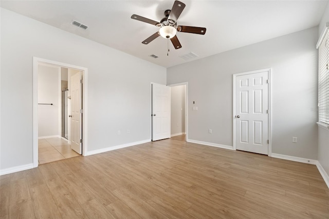 unfurnished bedroom featuring ceiling fan and light hardwood / wood-style flooring