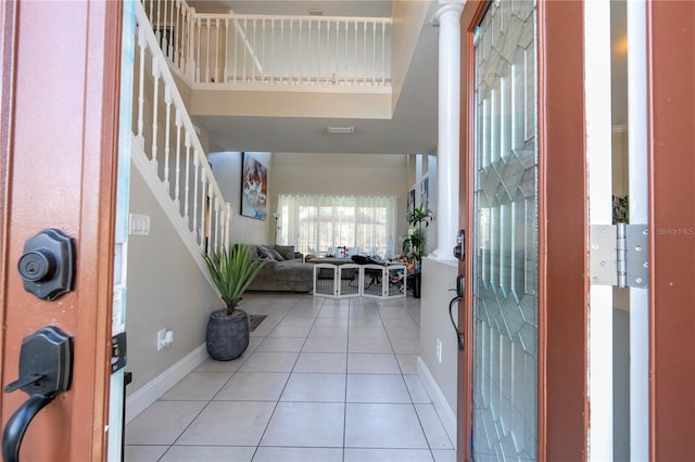 entrance foyer featuring light tile patterned floors