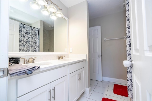 bathroom with vanity and tile patterned floors