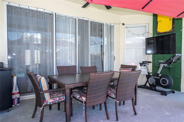 dining room featuring concrete flooring