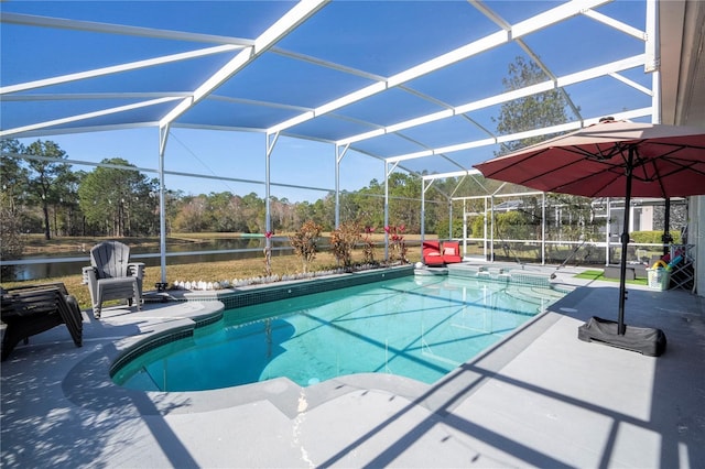 view of pool with a patio, a water view, and glass enclosure