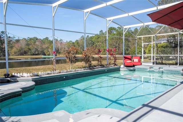 view of swimming pool with a patio area and glass enclosure