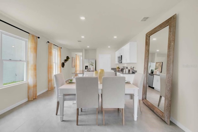 view of tiled dining space