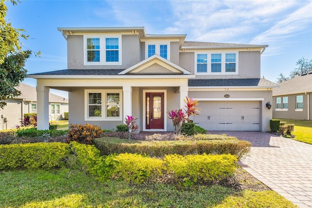 view of front of property with a garage