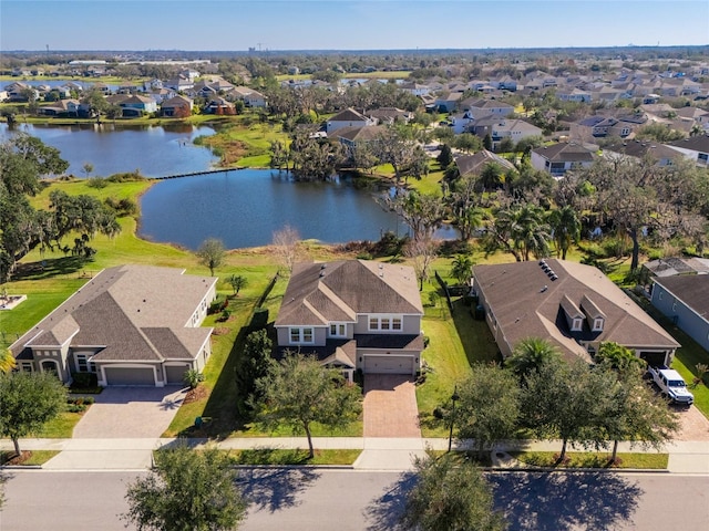 drone / aerial view with a water view