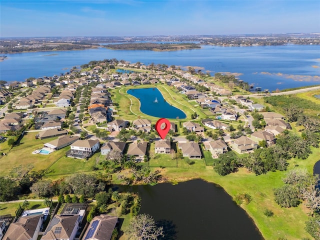 drone / aerial view featuring a water view