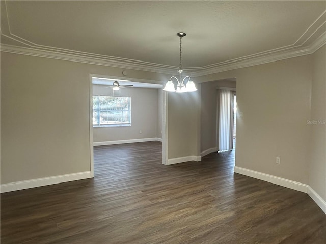 unfurnished dining area with crown molding, dark hardwood / wood-style flooring, and a chandelier