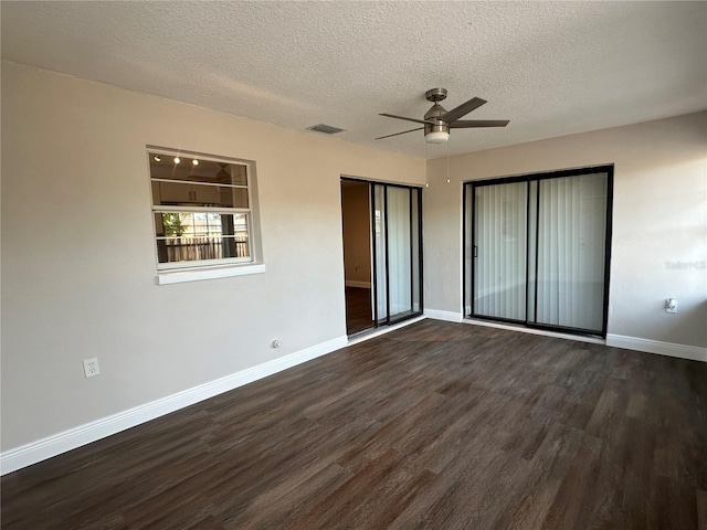 unfurnished bedroom featuring ceiling fan, dark hardwood / wood-style flooring, a closet, and a textured ceiling