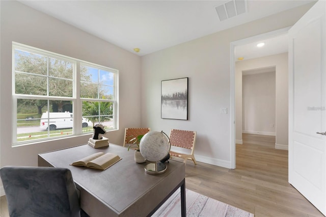 dining space featuring light hardwood / wood-style floors