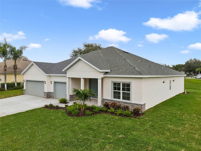 view of front of house with a garage and a front yard