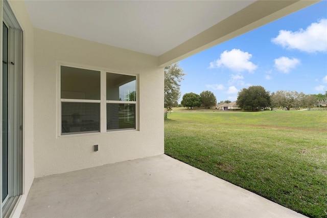 view of yard with a patio area