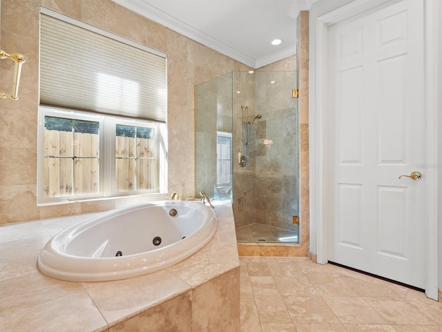 bathroom with tile patterned flooring, crown molding, and shower with separate bathtub