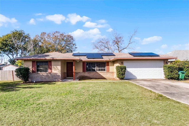 ranch-style house with a garage and a front lawn