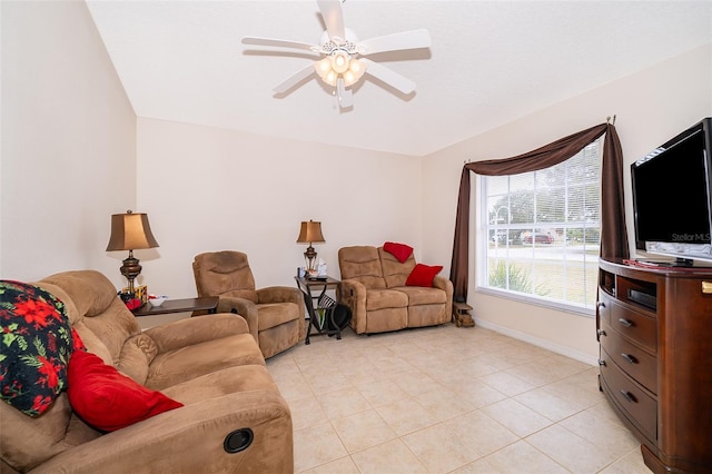 living room with light tile patterned floors and ceiling fan