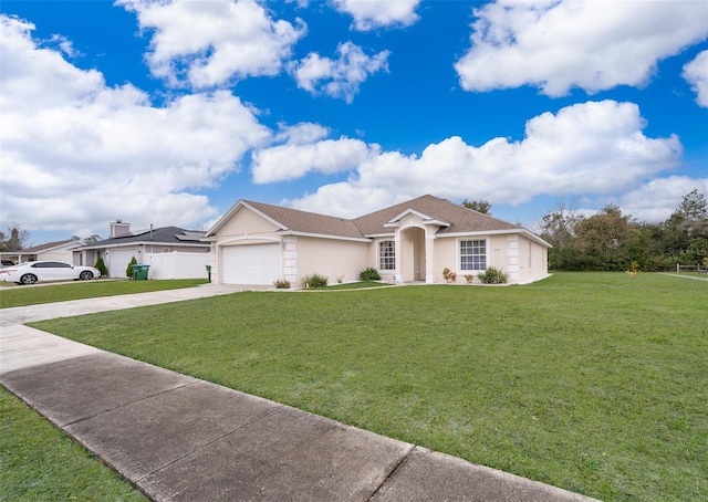 single story home with a garage and a front yard