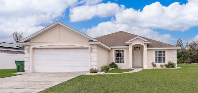 ranch-style home featuring stucco siding, driveway, a front lawn, fence, and an attached garage