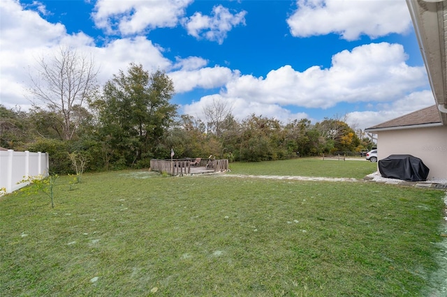 view of yard with fence