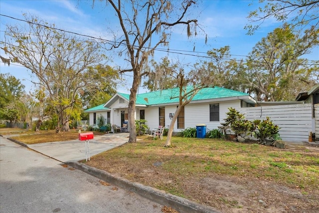 view of front of home with a front lawn