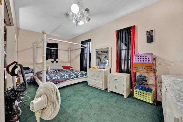 carpeted bedroom with a notable chandelier