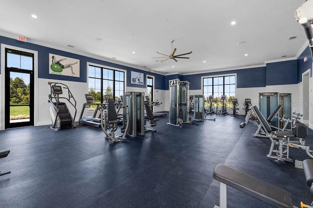 exercise room featuring ornamental molding