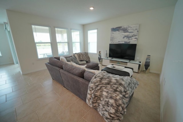 living room with light tile patterned flooring