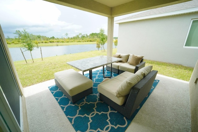 view of patio / terrace with a water view