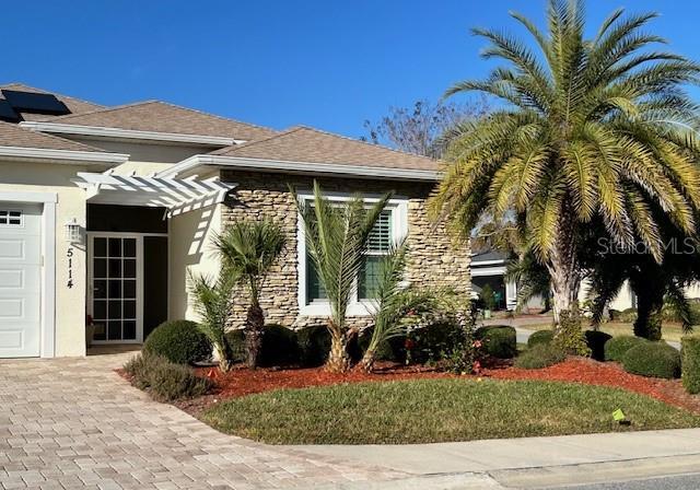 view of property exterior with a garage