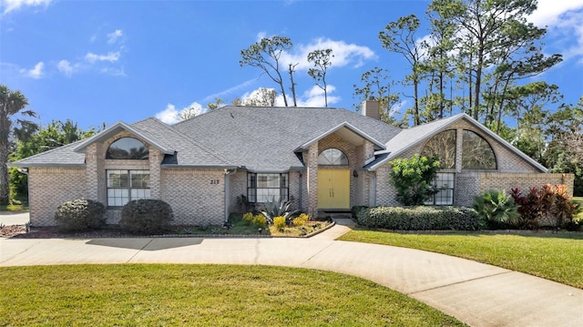 view of front of house featuring a front yard