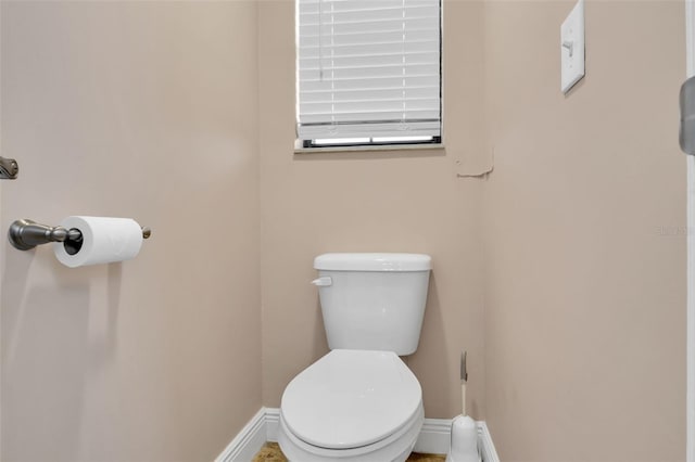 bathroom featuring toilet