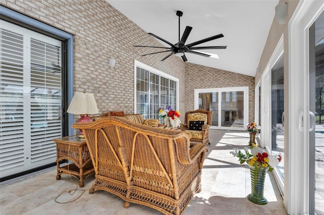 exterior space with ceiling fan and vaulted ceiling