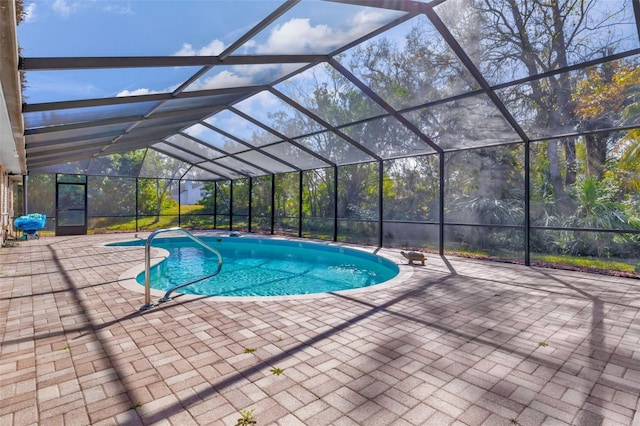 view of pool featuring a lanai and a patio area