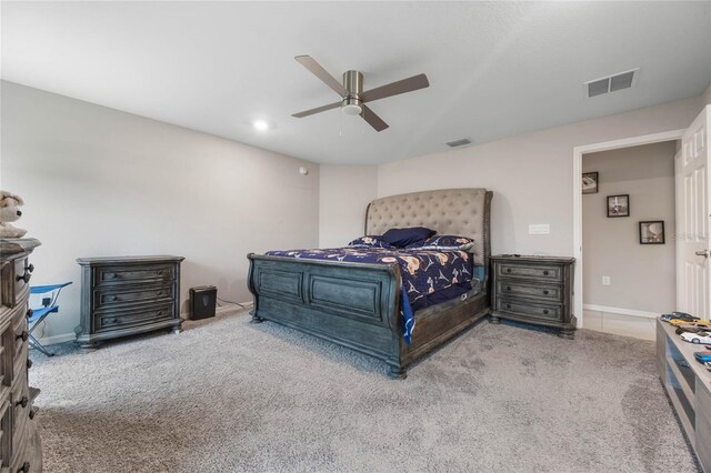 carpeted bedroom with ceiling fan