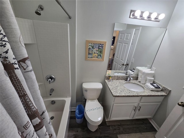 full bathroom with vanity, hardwood / wood-style floors, shower / bath combination with curtain, and toilet